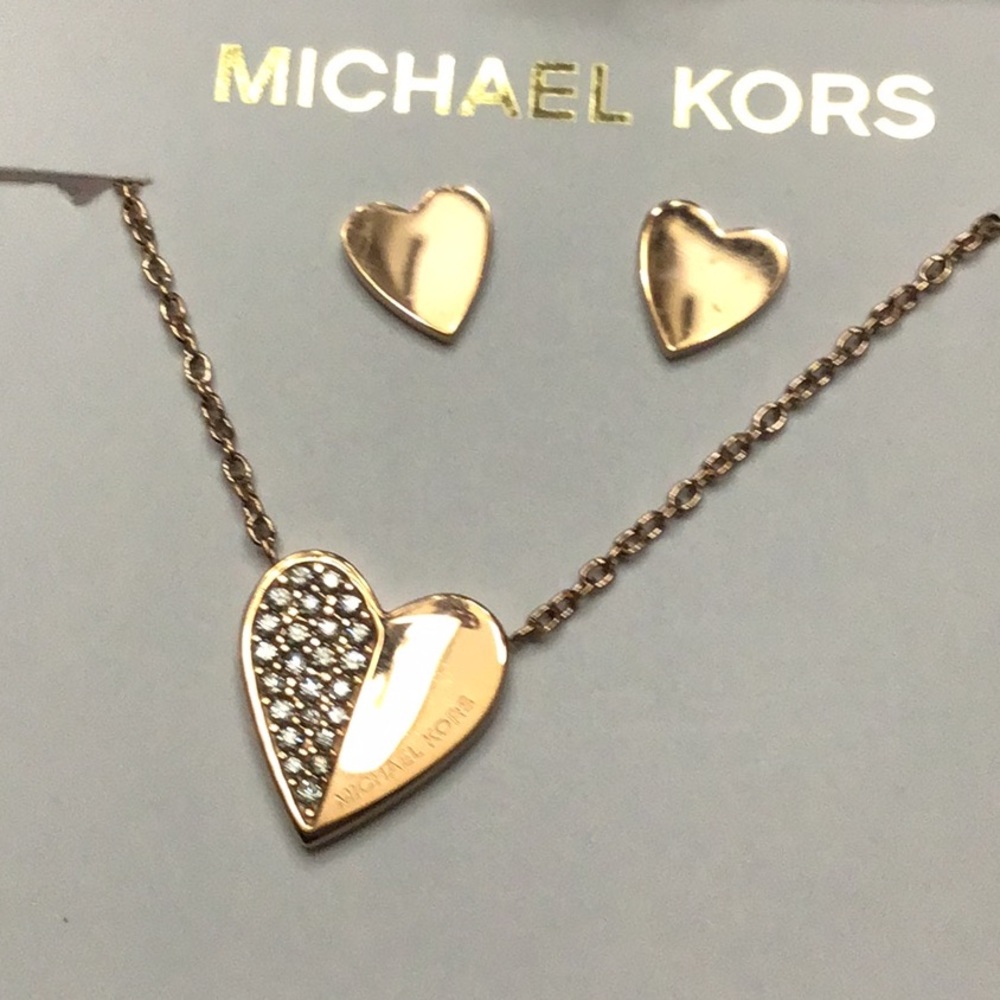 Michael Kors set Stud Earrings & Pavé Crystal Necklace in a rose gold tone.